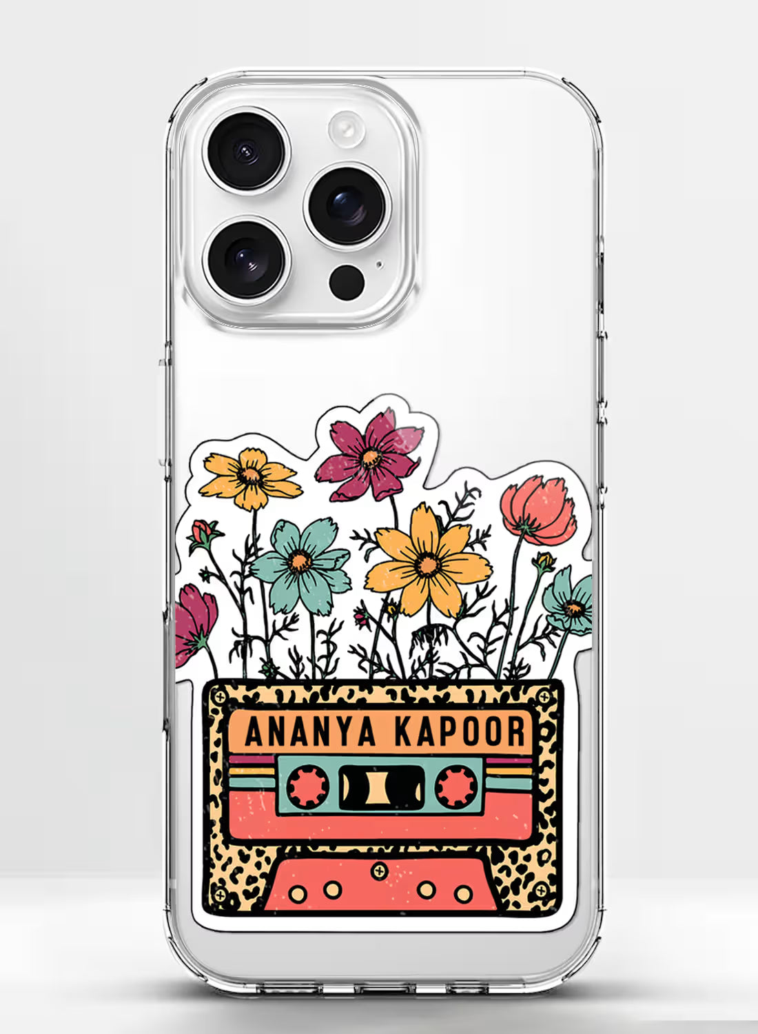 Custom name Ananya Kapoor printed on retro cassette label with wildflowers on clear silicone phone cover