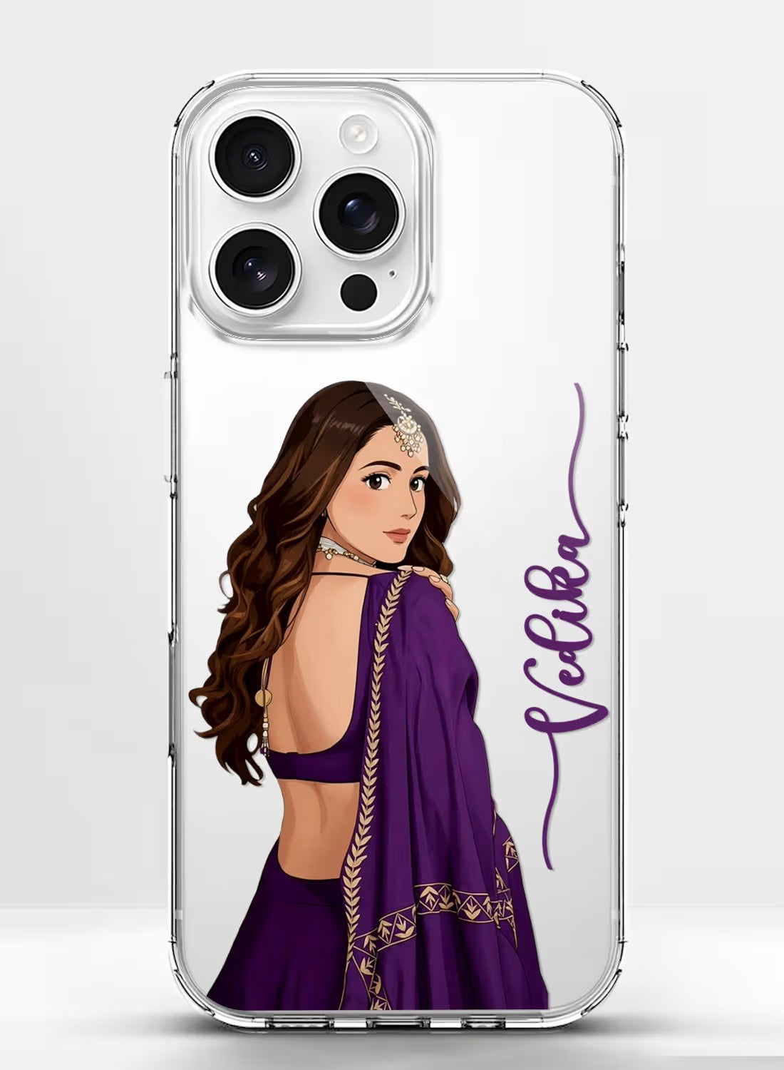 A sleek clear phone case featuring a stylish artistic portrait of a woman in a purple ethnic dress with custom name text.