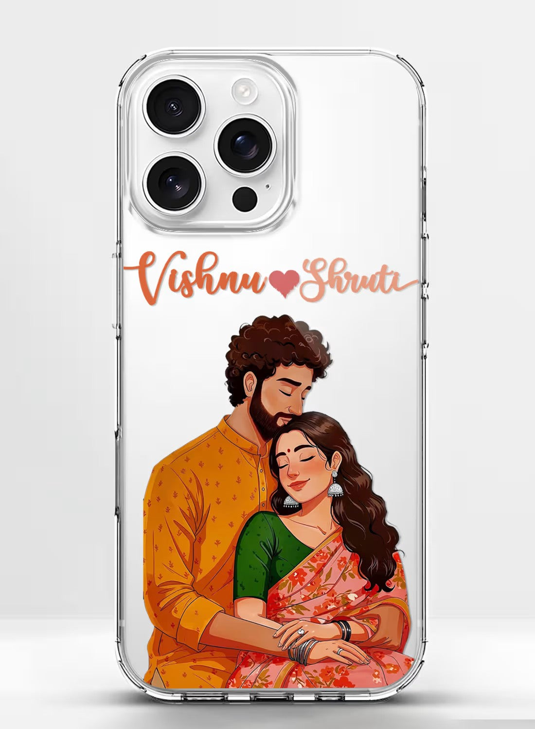 Personalized clear phone case featuring a romantic illustration of a couple in traditional Indian ethnic wear.