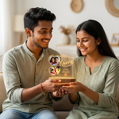 Brother and Sister holding a My Queen Sister Raksha Bandhan acrylic LED lamp with two heart photos and crown