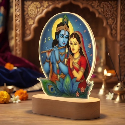 Radha Krishna acrylic LED lamp with rechargeable wireless wooden base and warm glow – spiritual gift by Fashionury