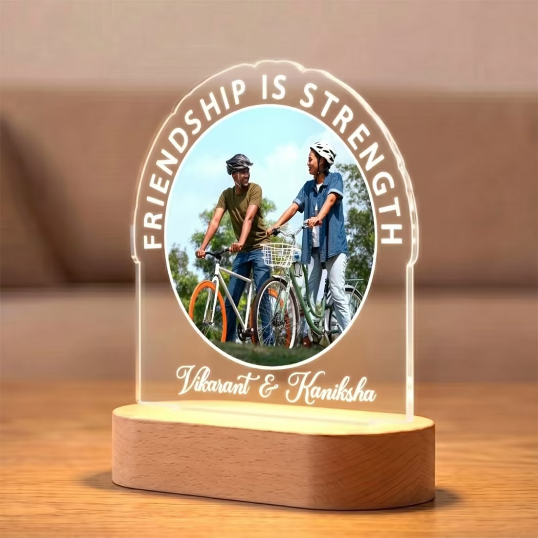 Side view of Friendship Is Strength acrylic LED lamp with bestie photo and custom names