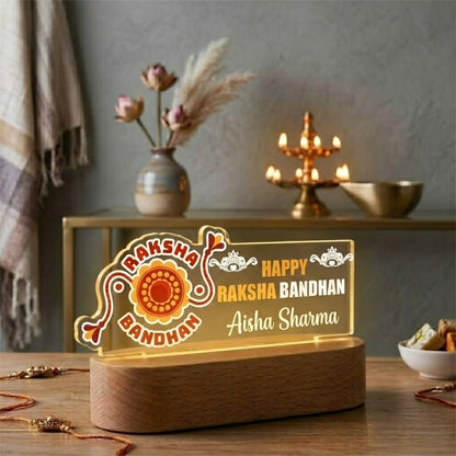 Happy Raksha Bandhan acrylic LED lamp with custom name and festive Rakhi motif
