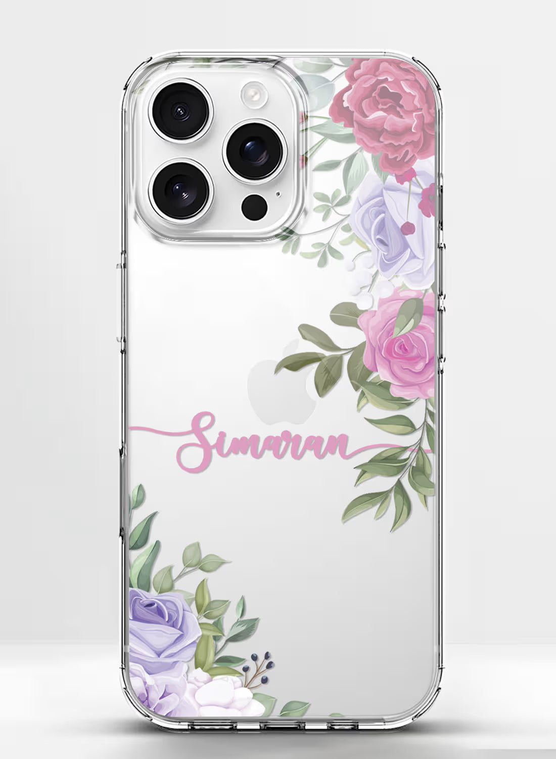 Custom name Simaran printed in pink script on a clear silicone phone case featuring pink and purple floral designs on the corners.