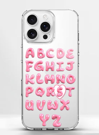 Custom clear silicone phone cover with pink bubble-letter alphabet text design, personalized name print