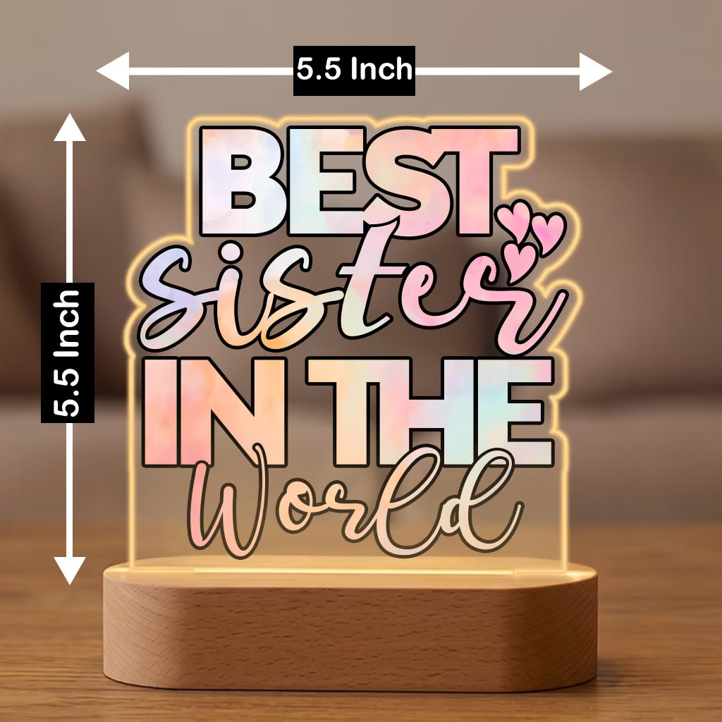 Size view of Best Sister in the World acrylic LED lamp with pastel typography on wooden base