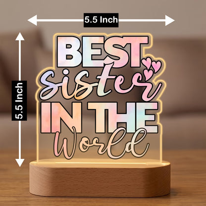 Size view of Best Sister in the World acrylic LED lamp with pastel typography on wooden base