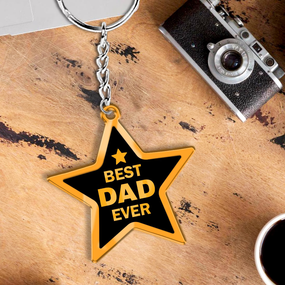 Best Dad Ever star shape acrylic keychain with golden text and metal ring

