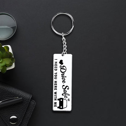 Drive Safe acrylic keychain with heartfelt quote, car and heart design