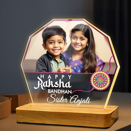 Personalized Raksha Bandhan acrylic LED lamp with custom photo and name, rakhi design and wooden base – Fashionury