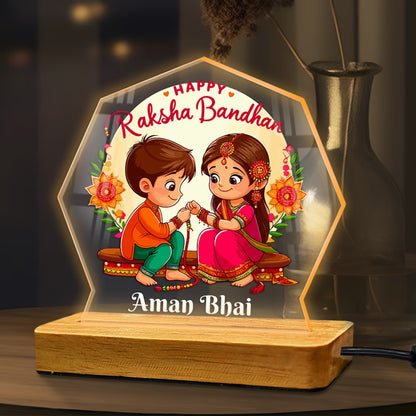 Personalized Raksha Bandhan acrylic LED lamp with cartoon brother sister design and custom name on wooden base – Fashionury
