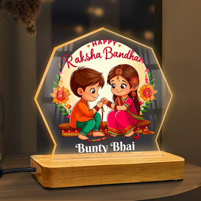 Personalized Raksha Bandhan acrylic LED lamp with cartoon brother sister design and custom name on wooden base – Fashionury