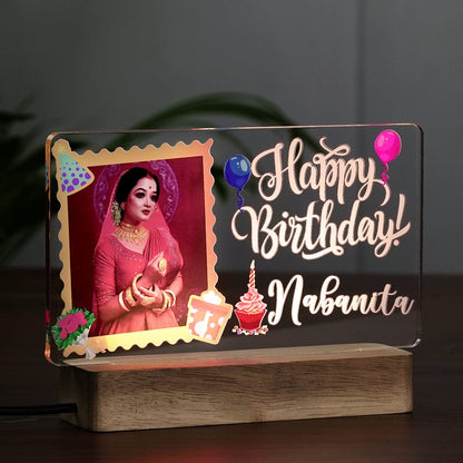 Side View of Close up of Colorful Birthday decor Acrylic Lamp with Balloons, Cake and Cap on Panel