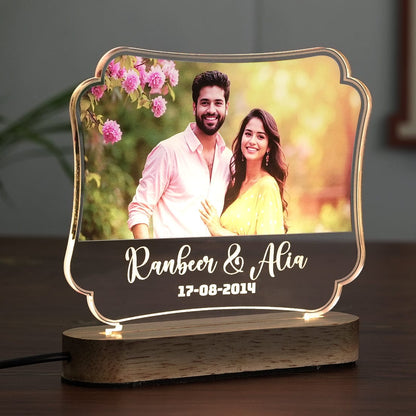 Side View of Acrylic LED Photo Lamp placed on a bedside table as a Night Light