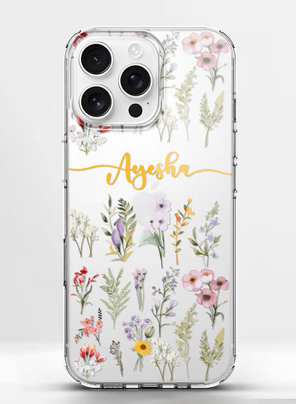 Clear silicone iPhone case featuring a delicate watercolor wildflower design with space for a custom name in gold script.