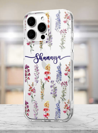 Clear silicone phone case featuring colorful watercolor wildflowers and a custom name placeholder in elegant script font.