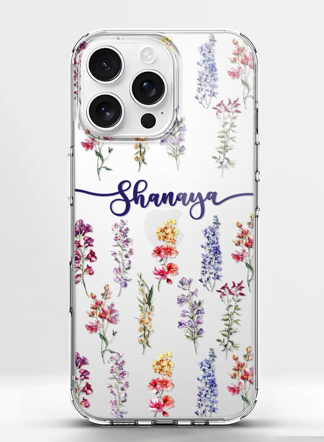 Clear silicone phone case featuring colorful watercolor wildflowers and a custom name placeholder in elegant script font.