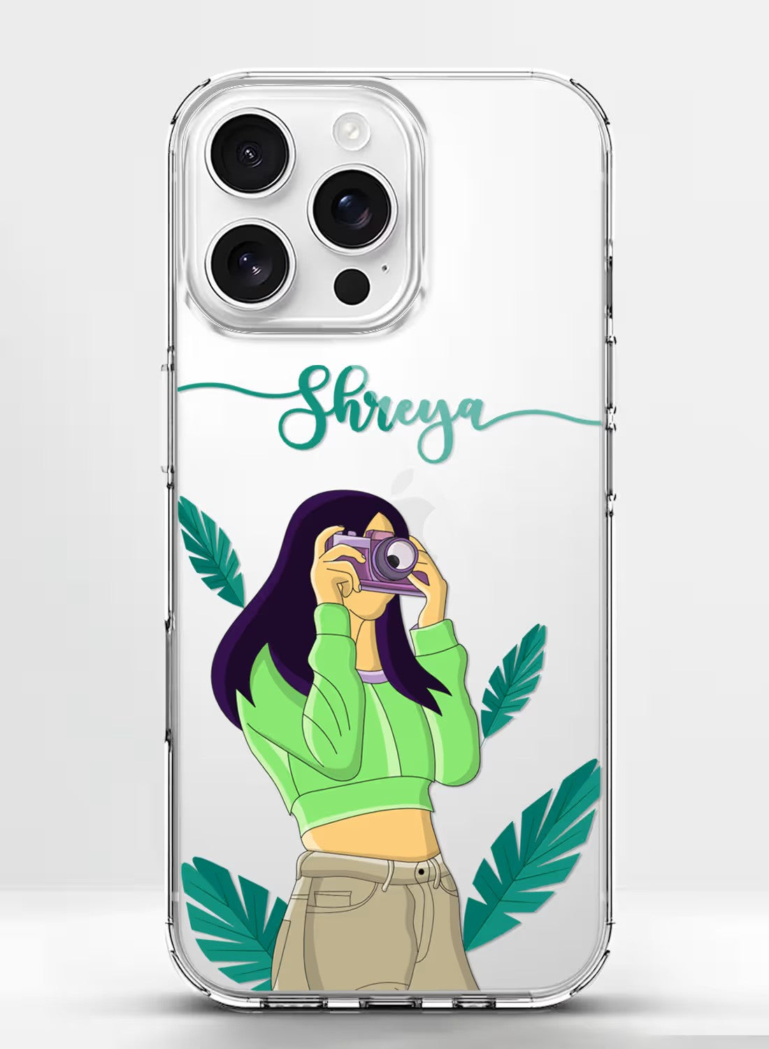 Clear phone case featuring an artistic girl photographer design with customizable text and tropical botanical prints.