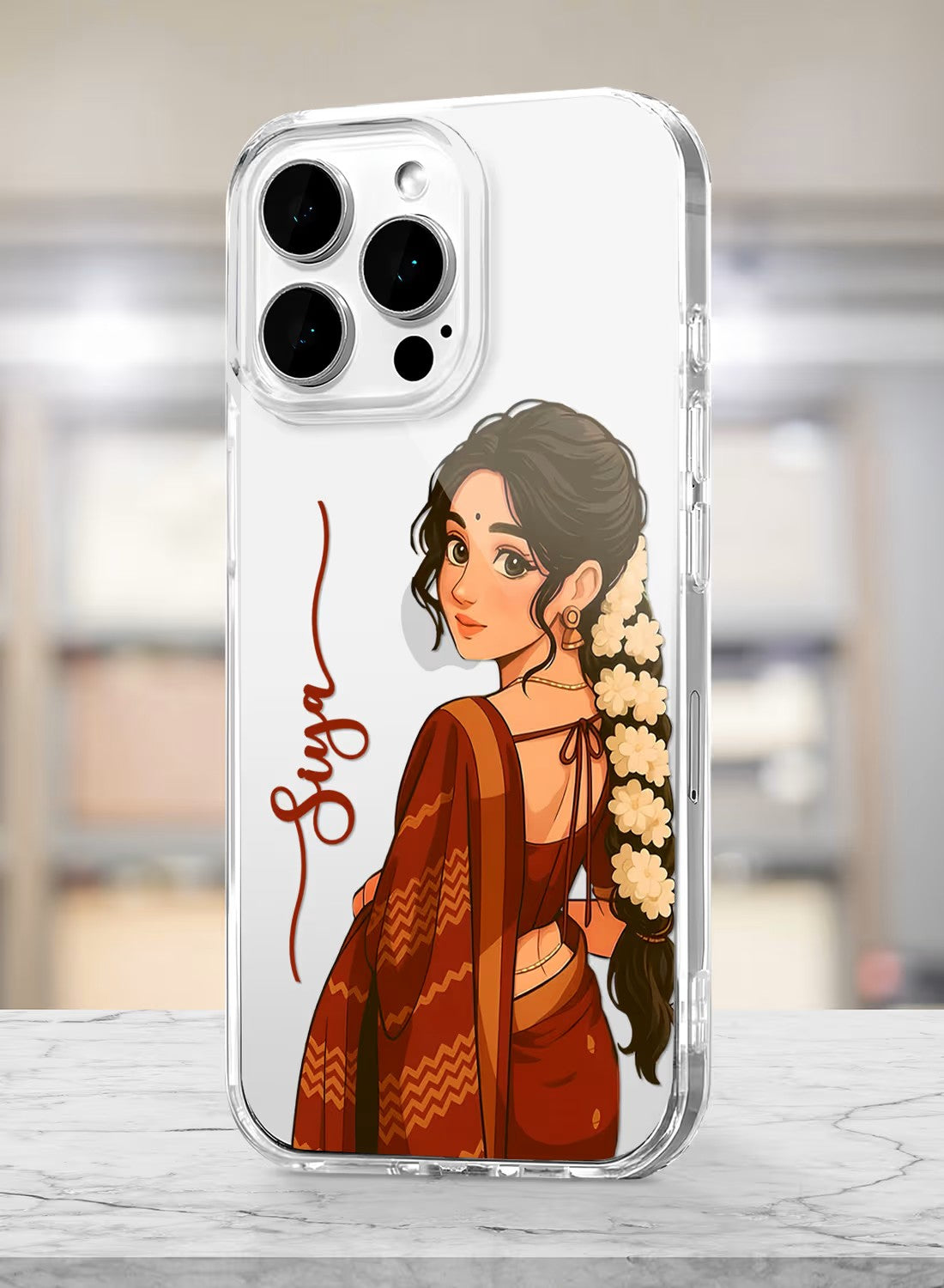 Clear silicone phone case featuring an artistic portrait of a girl in a traditional saree and jasmine flowers with custom text.