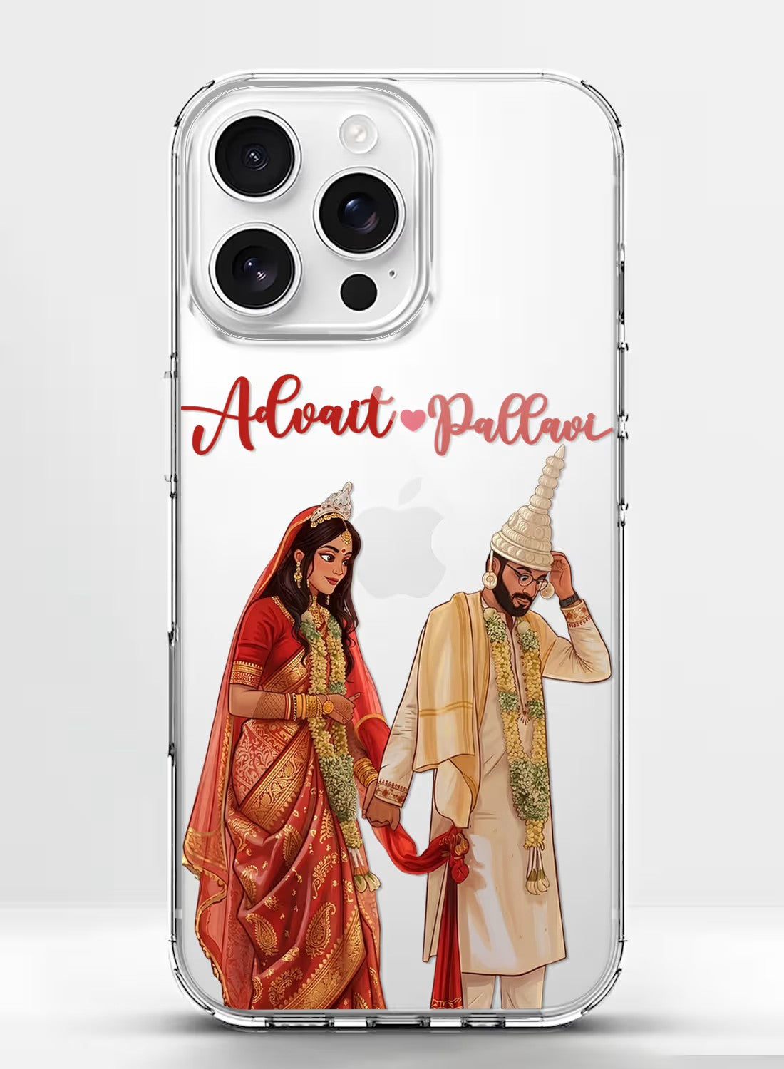 A clear phone case featuring a beautifully detailed illustration of an Indian couple in traditional wedding attire.