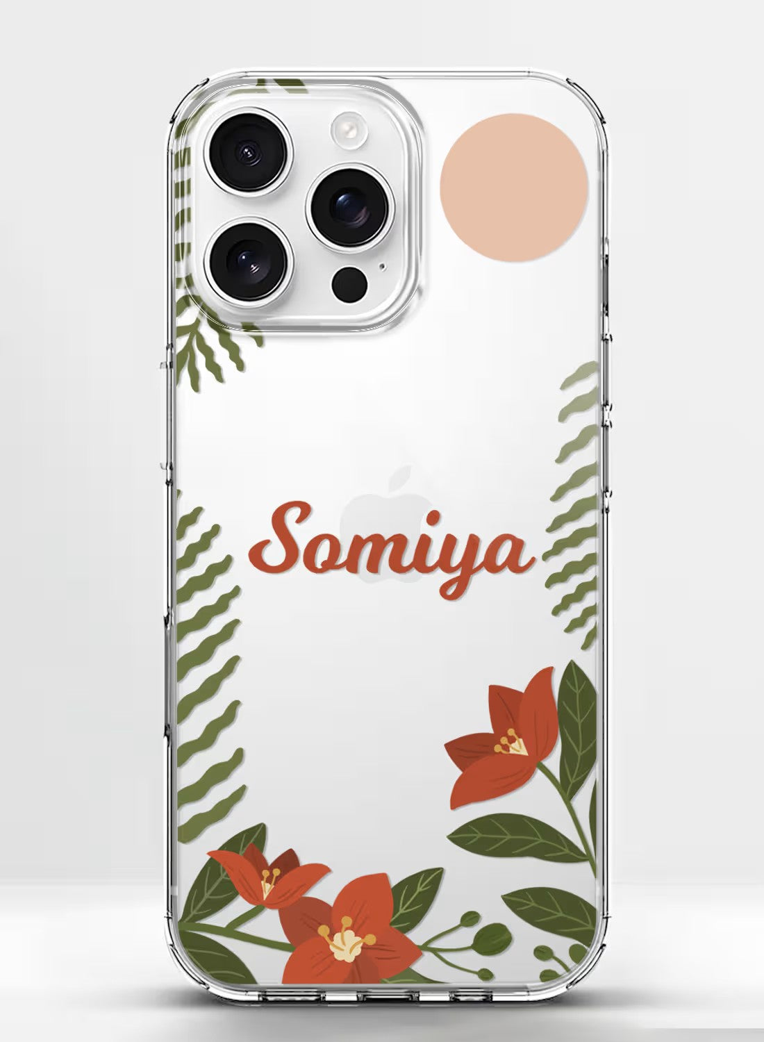 Custom name clear phone case with artistic red flowers and green botanical leaves design for aesthetic protection.
