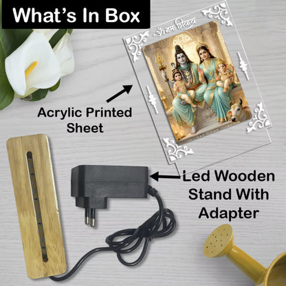 Shiv Parivar acrylic LED table lamp with Om Namah Shivay design and warm glow on wooden stand – Fashionury