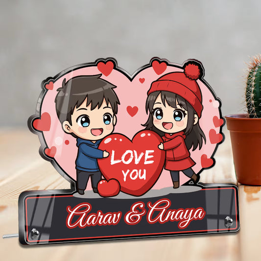 Custom text portrait frame. Heart-shaped acrylic stand with cute cartoon couple holding 'Love You' heart.