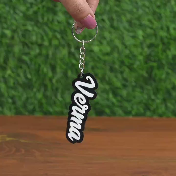 Video showing the unique cutout shape of Custom Name Acrylic Keychain for backpack and keys