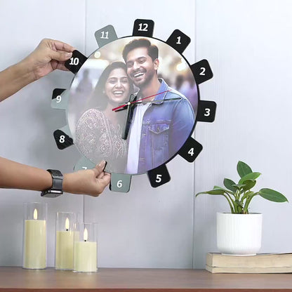 Close up video of glossy black acrylic material and clock mechanism