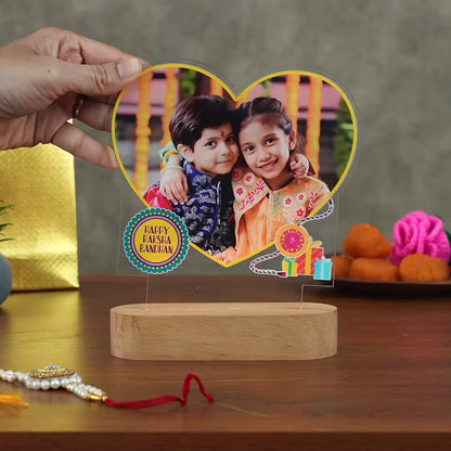 Showcase video of an acrylic LED lamp with the text of Happy Raksha Bandhan