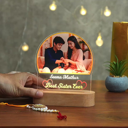 Showcase video of an acrylic LED lamp with the best sister ever text for raksha bandhan