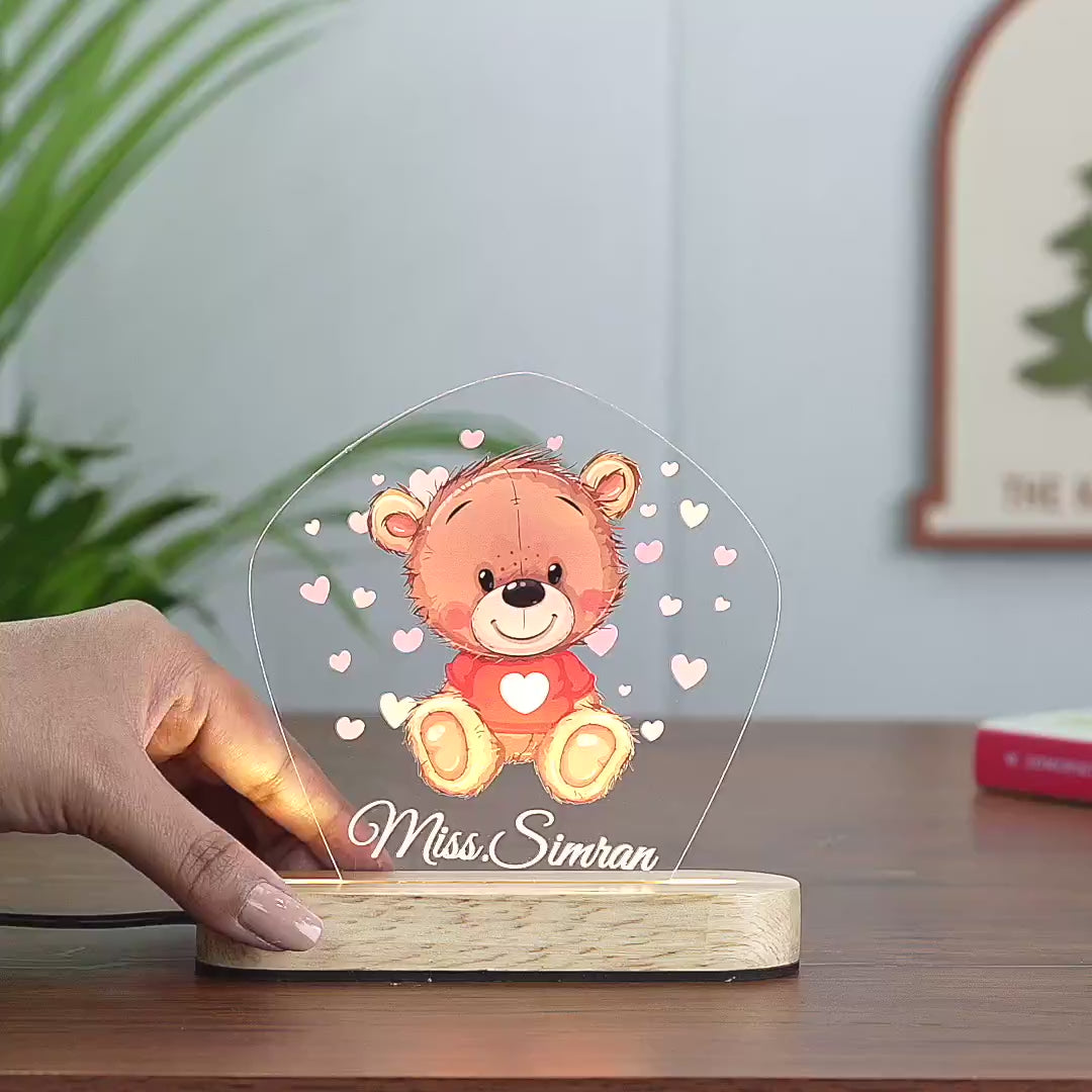 Panning video showing the pentagon shape, the pink hearts, and the personalized name