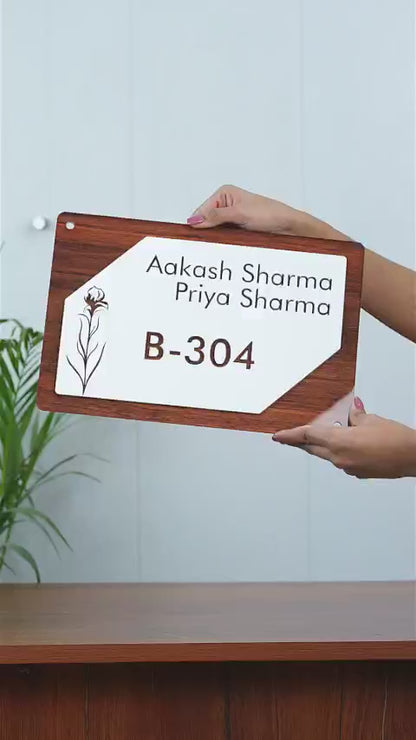Showcase video of a household nameplate with a custom name and address on a door.