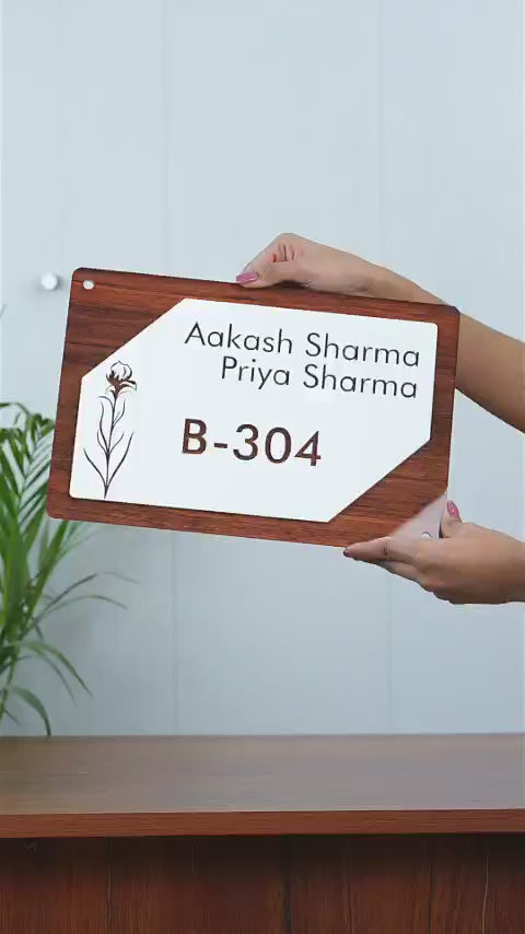 Showcase video of a household nameplate with a custom name and address on a door.