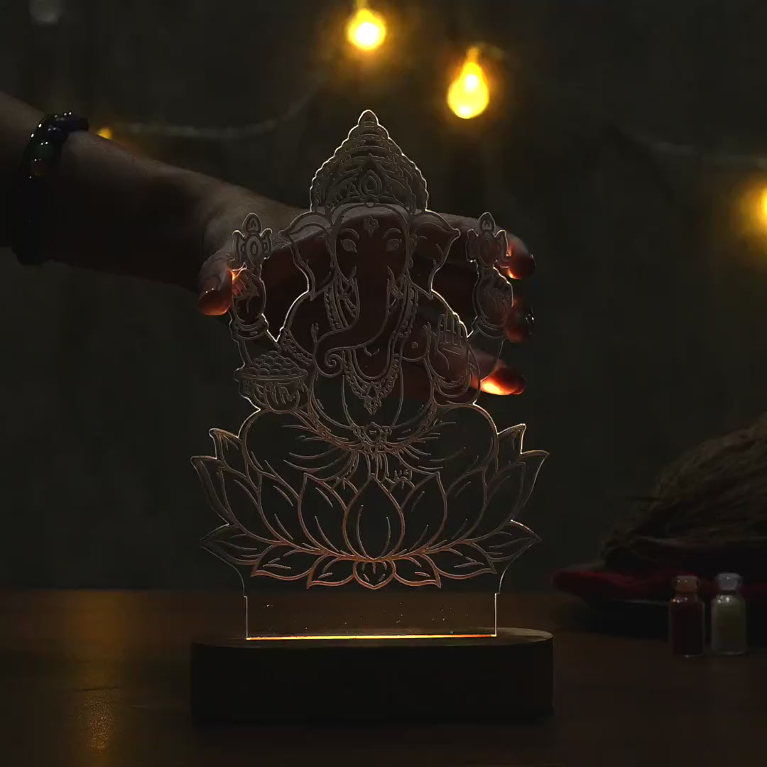 Showcase Video of Lord Ganesha on lotus UV printed acrylic LED lamp with warm glow and rechargeable wireless wooden base – Fashionury