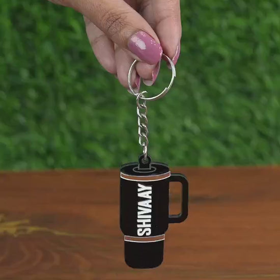Video of demonstrating how the Mini Tumbler Keychain looks on a backpack or key